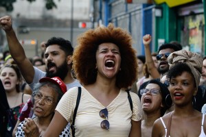 Demonstrators carry out act after Councillor Marielle Franco on Paulista Avenue in Sao Paulo, on Sunday, 18 March 2018. Marielle Franco and your driver Anderson Pedro Gomes, were shot dead on Wednesday night 14 March 2018, in the central region of the city of Rio de Janeiro. (Photo by Fabio Vieira/FotoRua/NurPhoto)